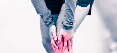person suffering from knee pain